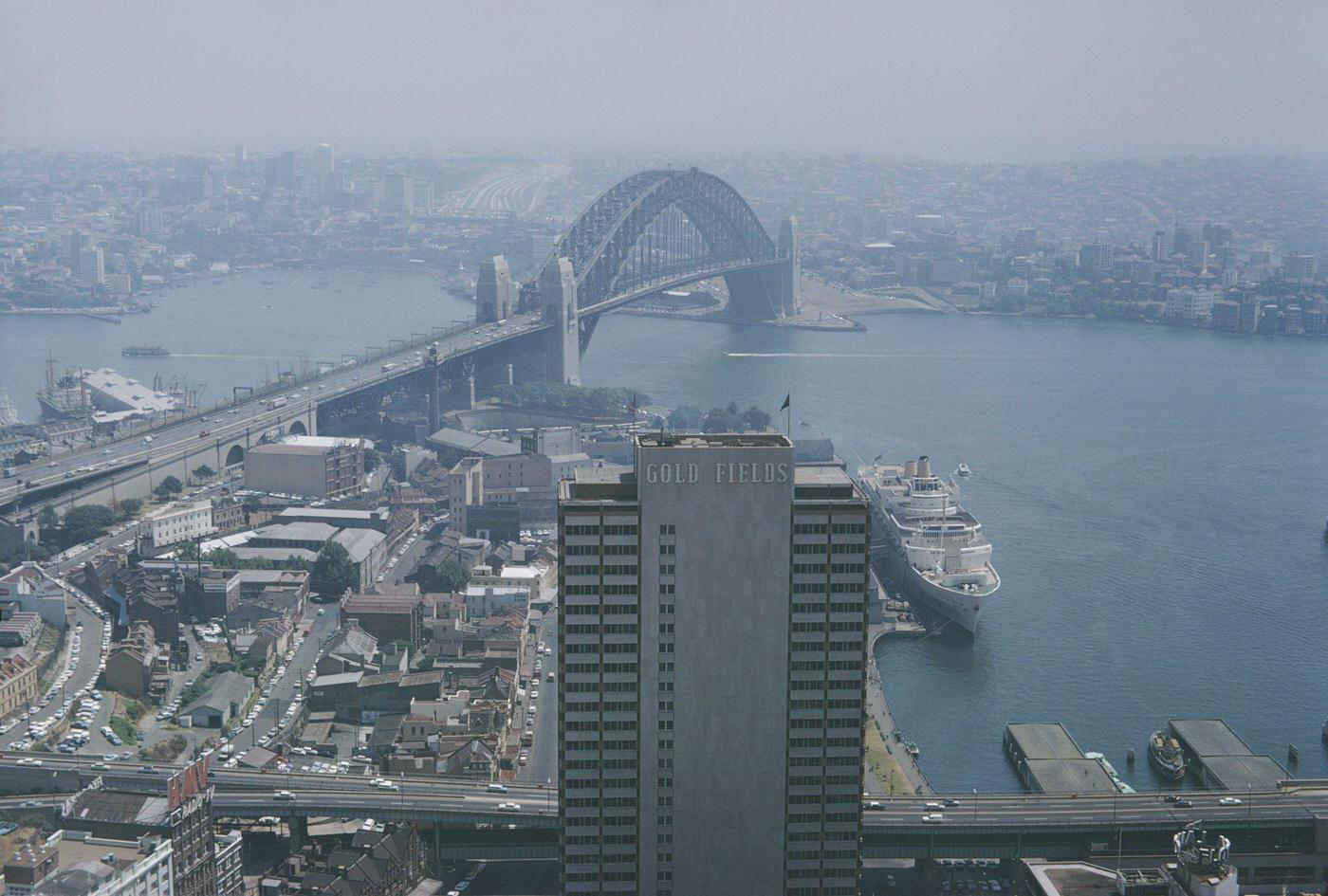 Gold Fields House and Sydney Harbour Bridge in Sydney, Australia, 1968.