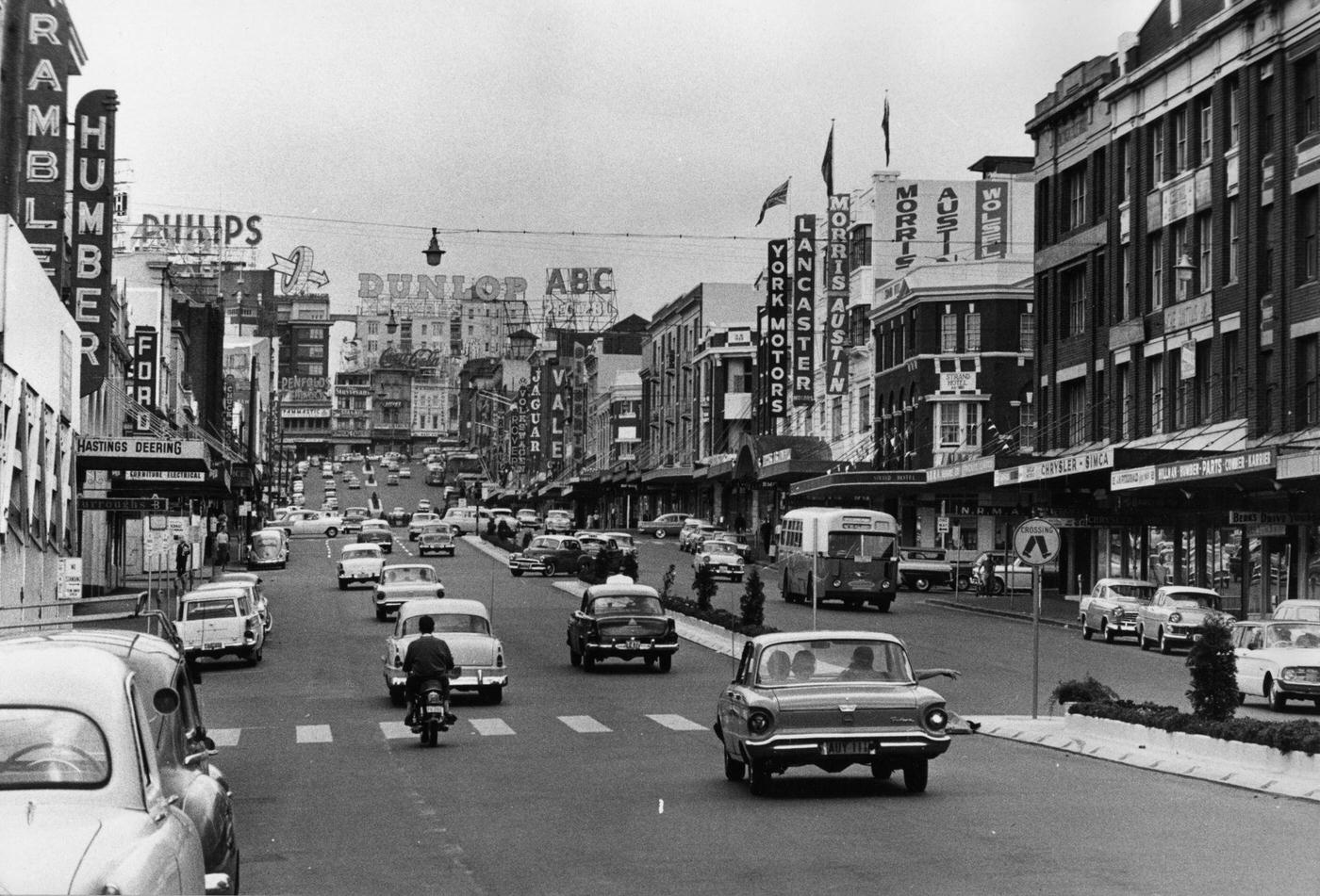 Traffic on a high street in Sydney, 1963