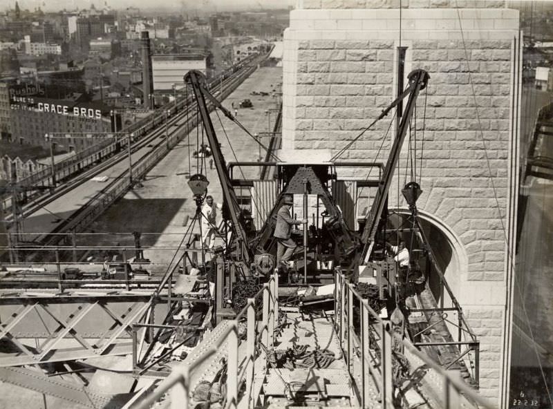 Painting crane and staging on top chord, February 22, 1932