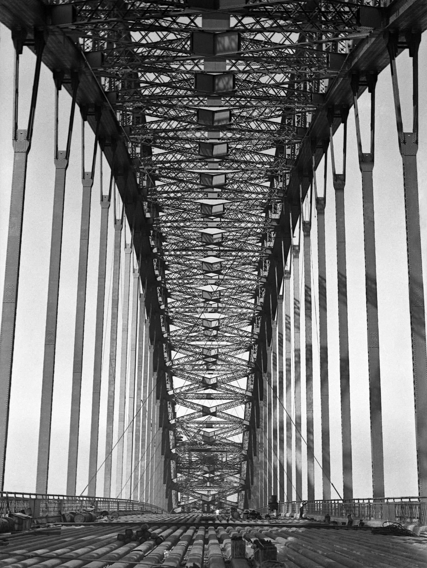 Steel troughs of the roadway deck prior to coke concrete being poured into them, during construction of the Sydney Harbor Bridge, 1931