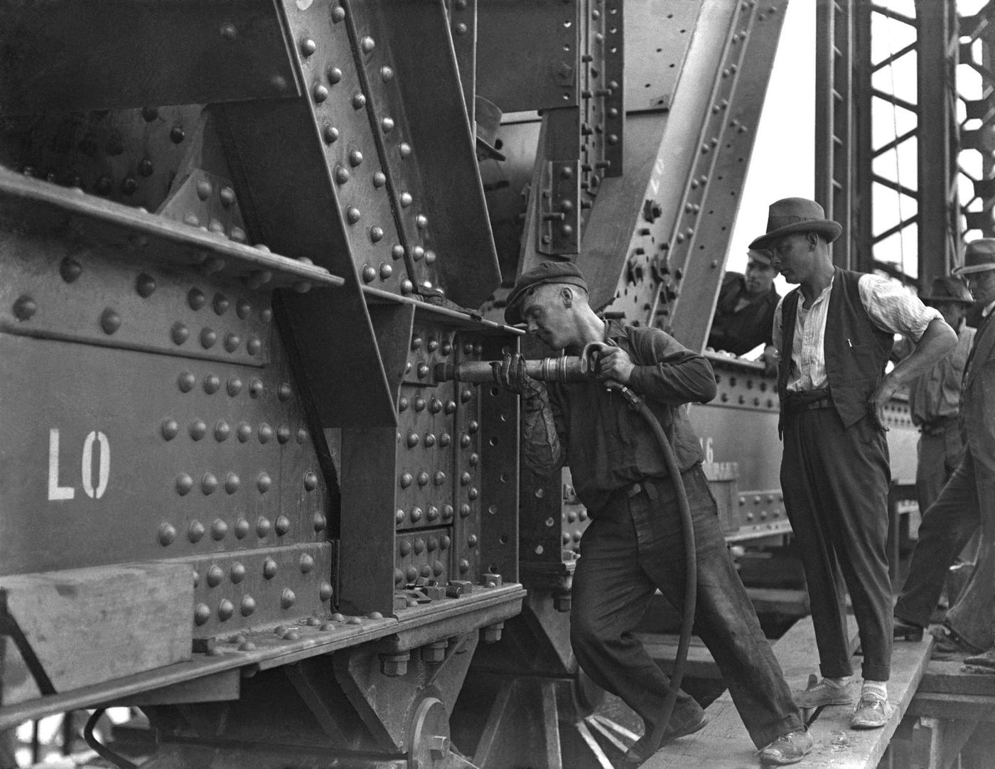 Laborers at work during construction on the Sydney Harbour Bridge, 1931.