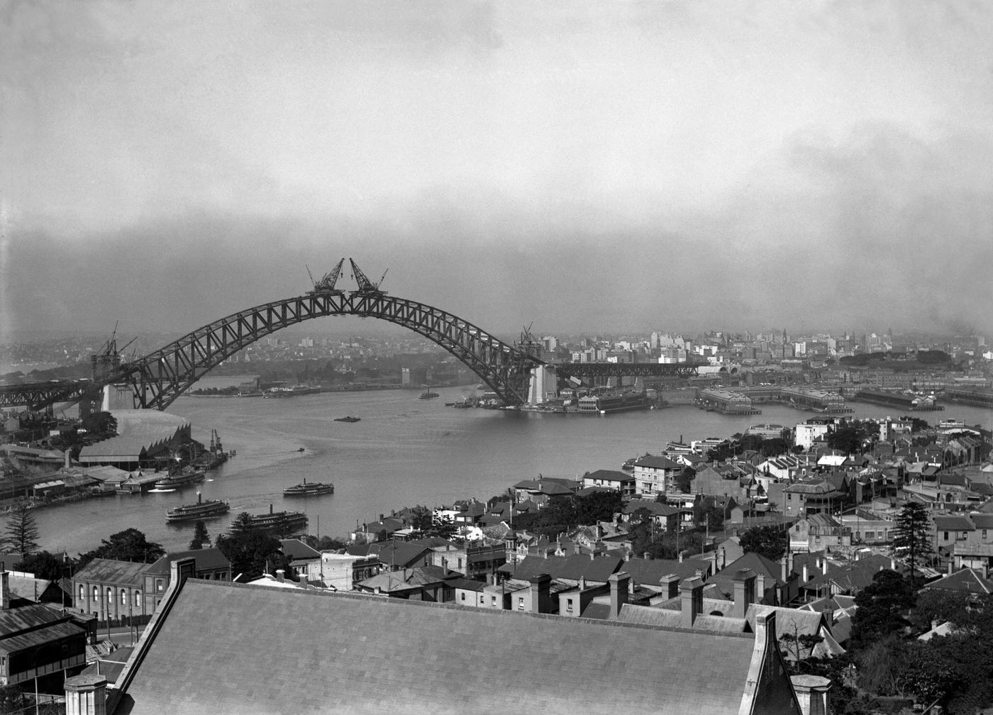 Constructing Sydney Harbor Bridge. View from North Sydney. August 12th, 1930.