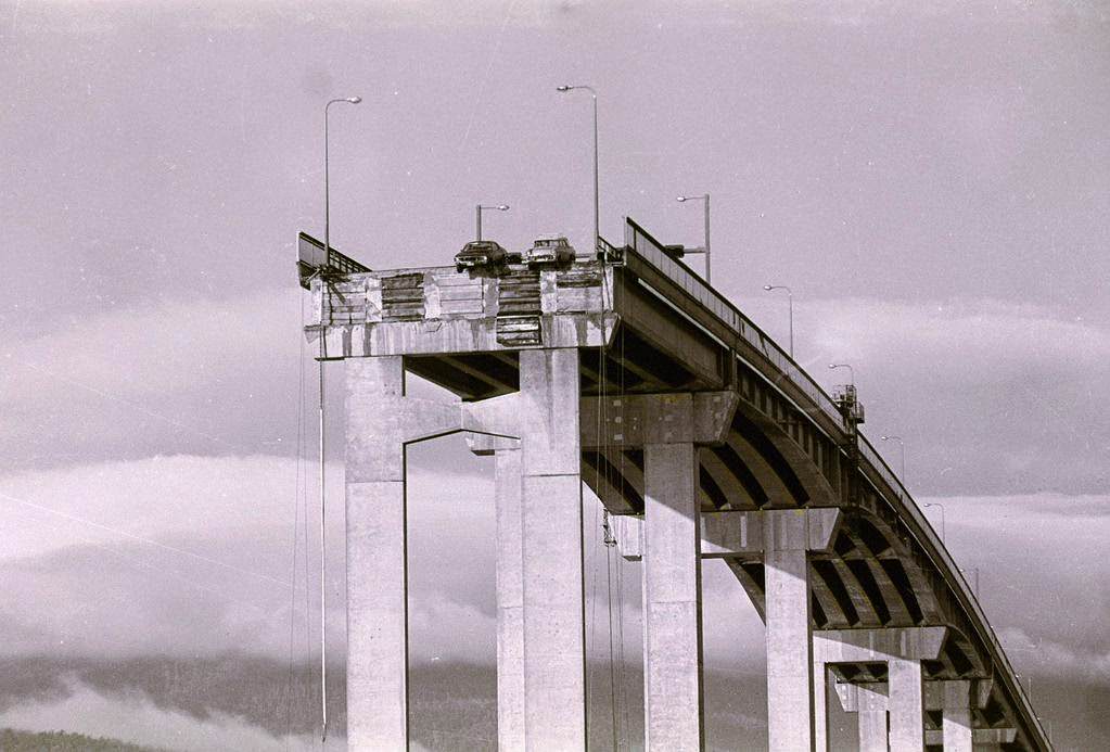 The Tasman Bridge disaster occurred in Hobart, Tasmania (Australia) on January 5, 1975. 12 people lost their lives; these cars left dangling over the edge were some of the lucky ones.