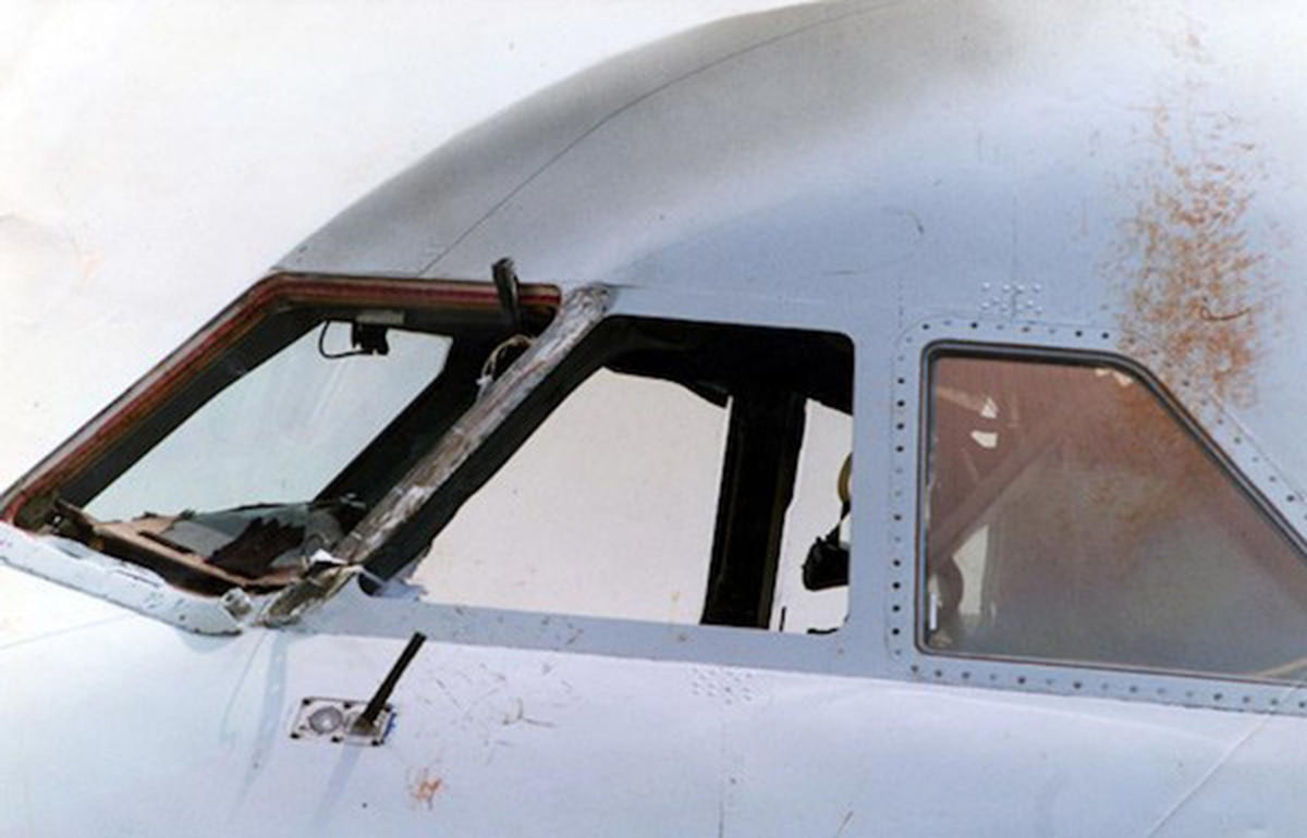 The cockpit of the British Airways Bac 1-11 with two windows missing.