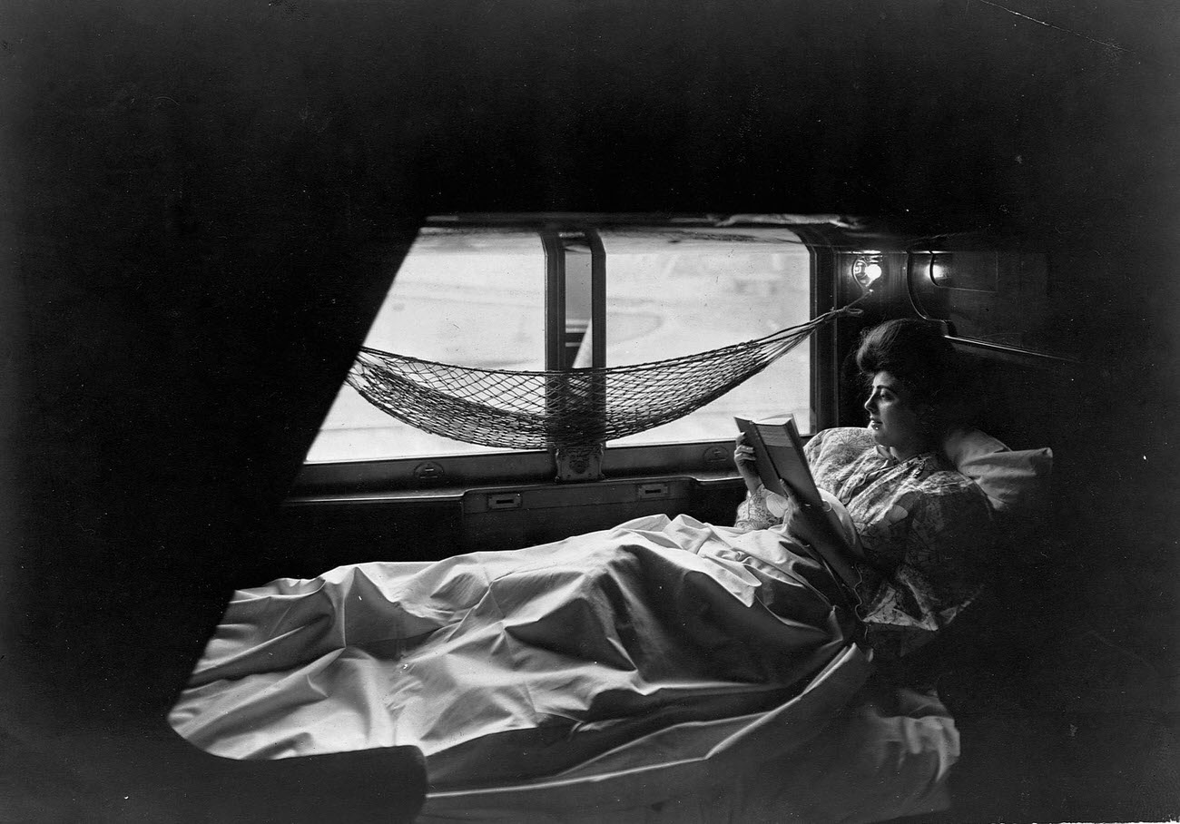 Woman Reading in Traincar