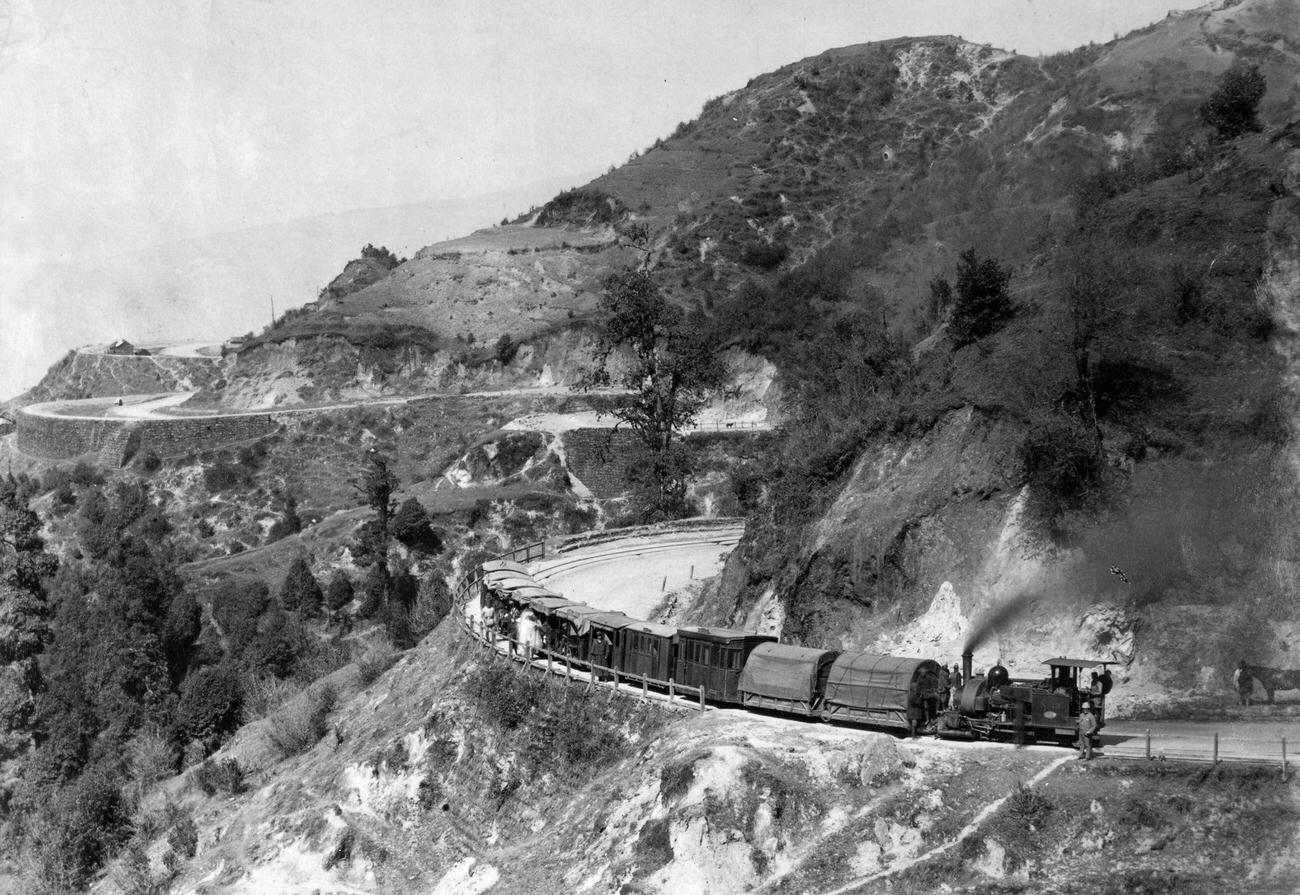 A typical curving section of the Darjeeling-Himalayan Railway running through the hills.