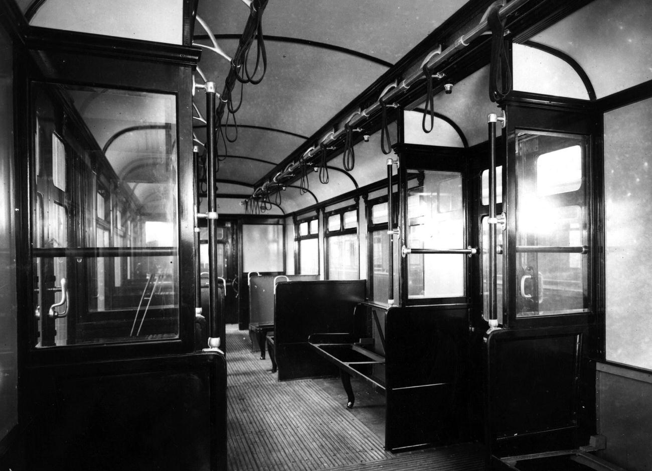 The interior of a District Line Underground carriage.