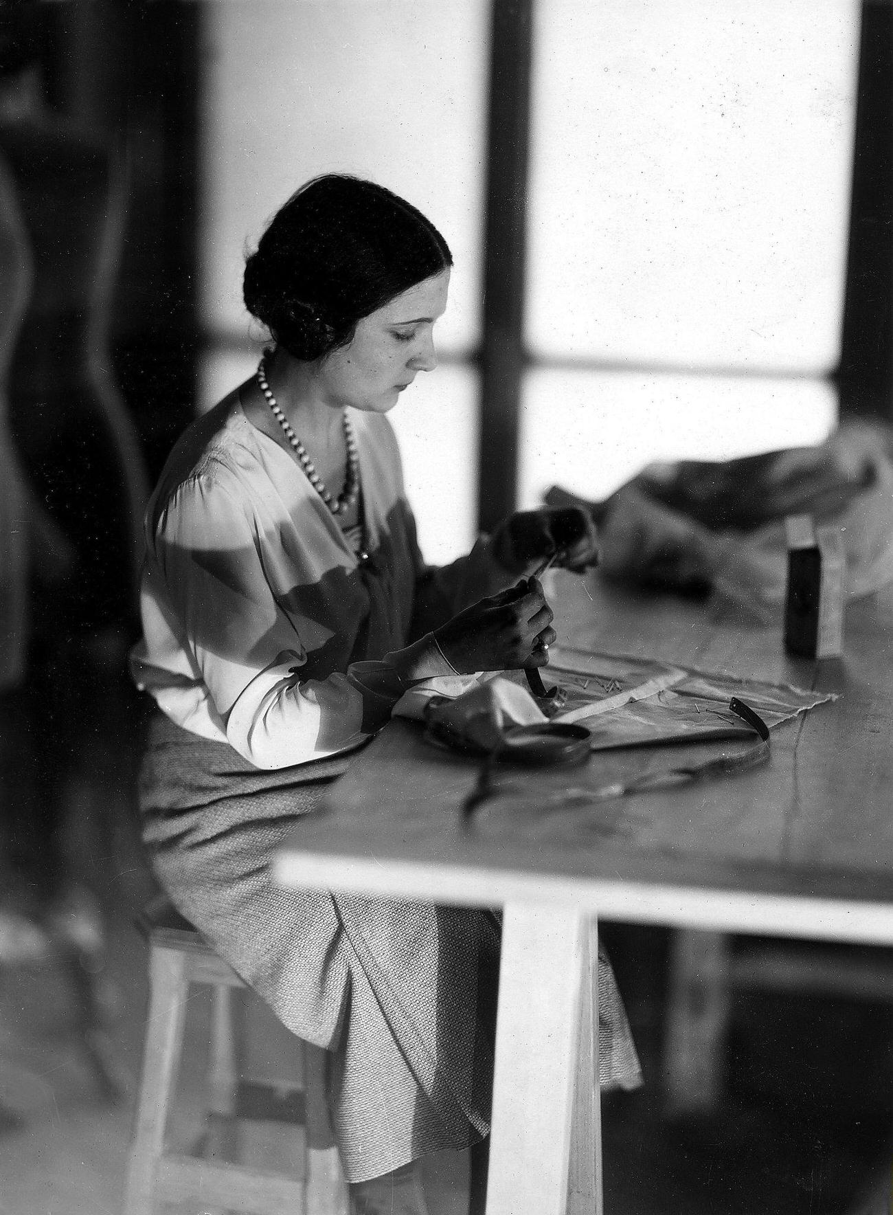 A future tailor during her training course, 1931