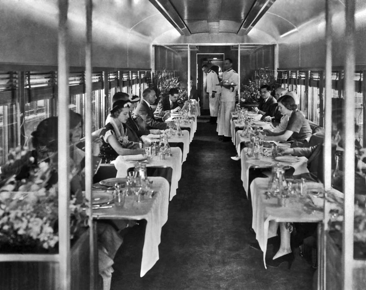 Passengers dine in the Art Deco-style car of the New York Central Railroad’s Mercury train, 1936.