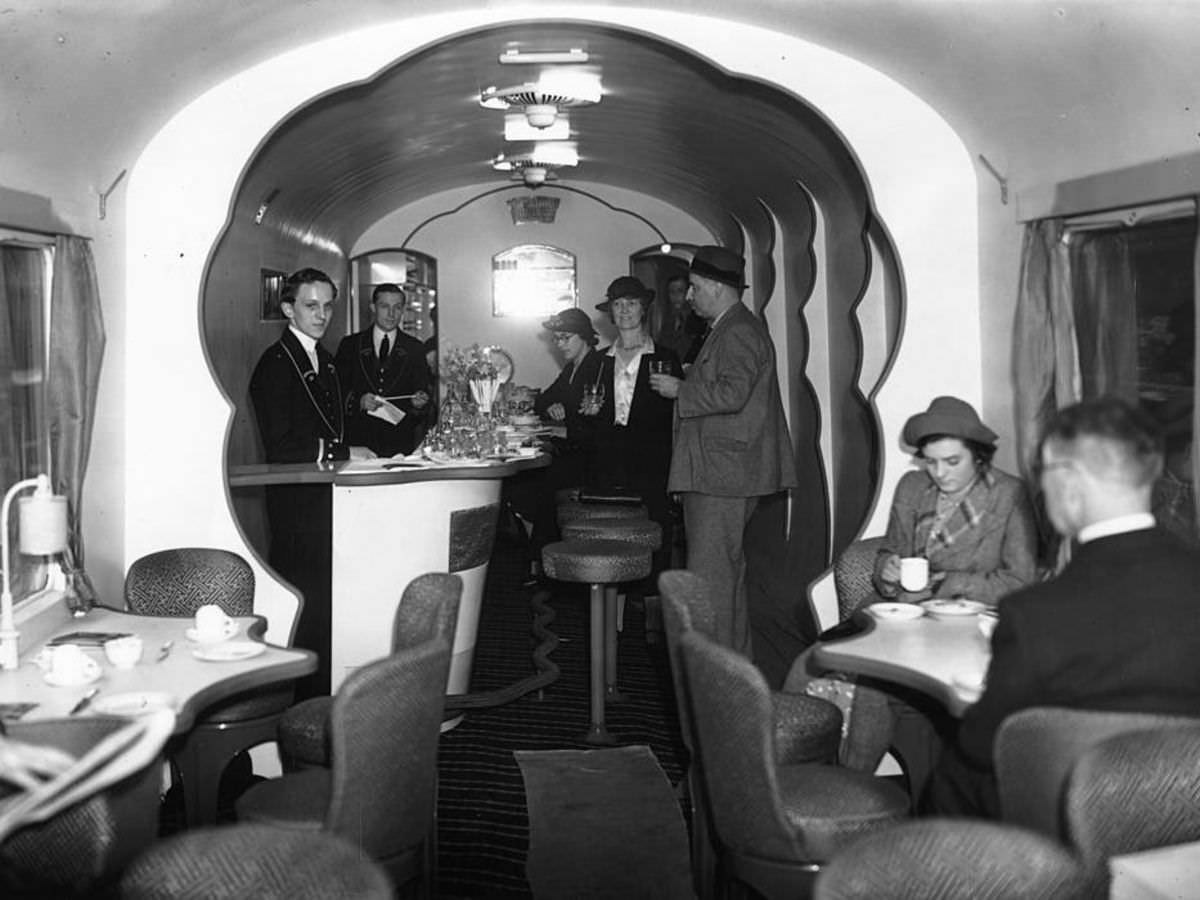 A corridor buffet car built for the new electric main line from London to Bognor Regis, Chichester and Littlehampton districts on show at Waterloo station, London in 1938.