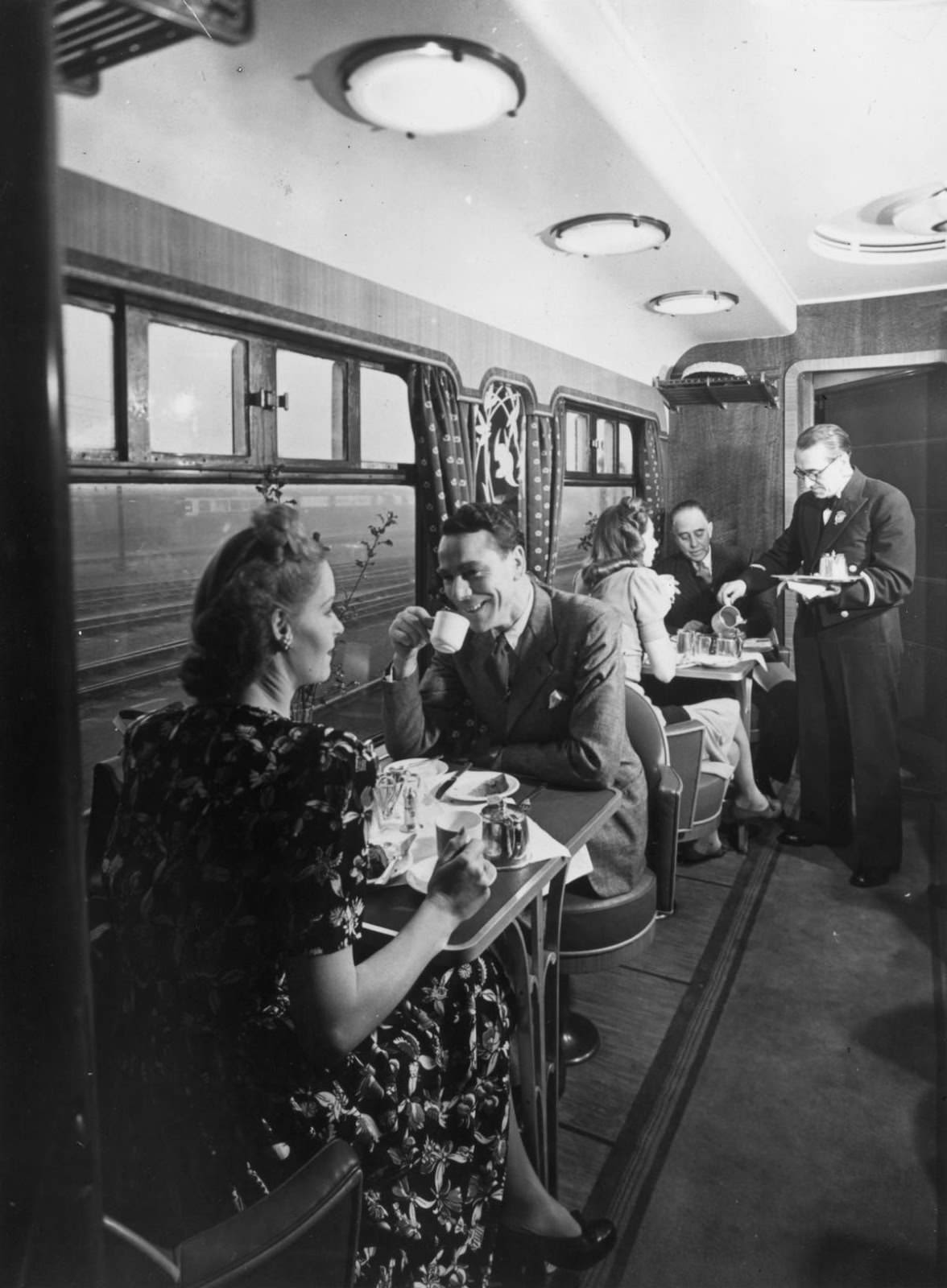 Diners in the restaurant car on a GWR (Great Western Railway) oil-fired locomotive, 1946.
