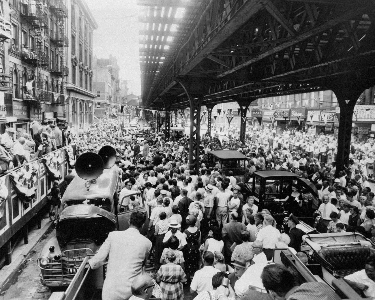 Crowds gather around platform at 86th Street station as speakers pay tribute to the about to be torn down Third Avenue El train tracks