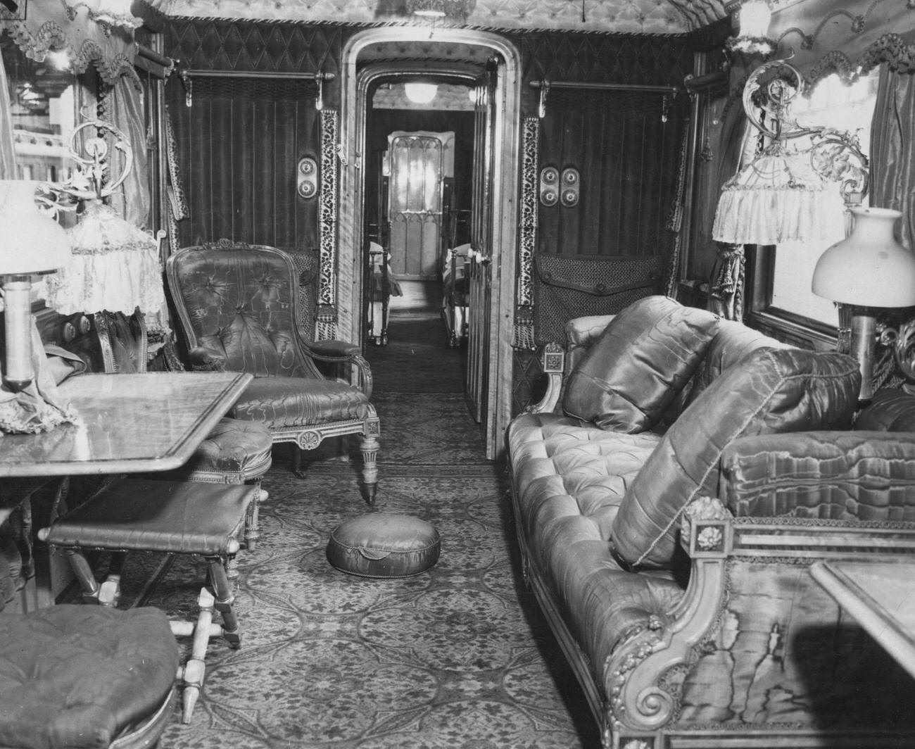 Queen Victoria's sitting room in one of the Royal coaches being displayed at a Coronation exhibition at Battersea Wharf Station, London