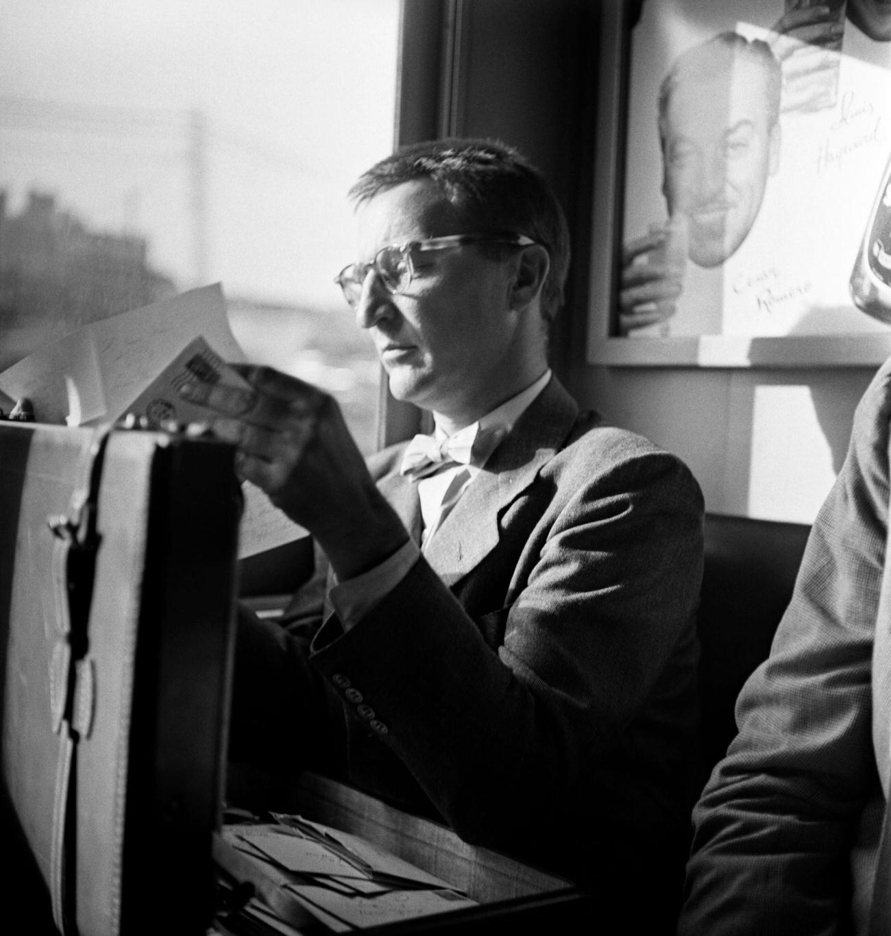 CBS television personality and train commuter Garry Moore leaves Grand Central Terminal, 1951.