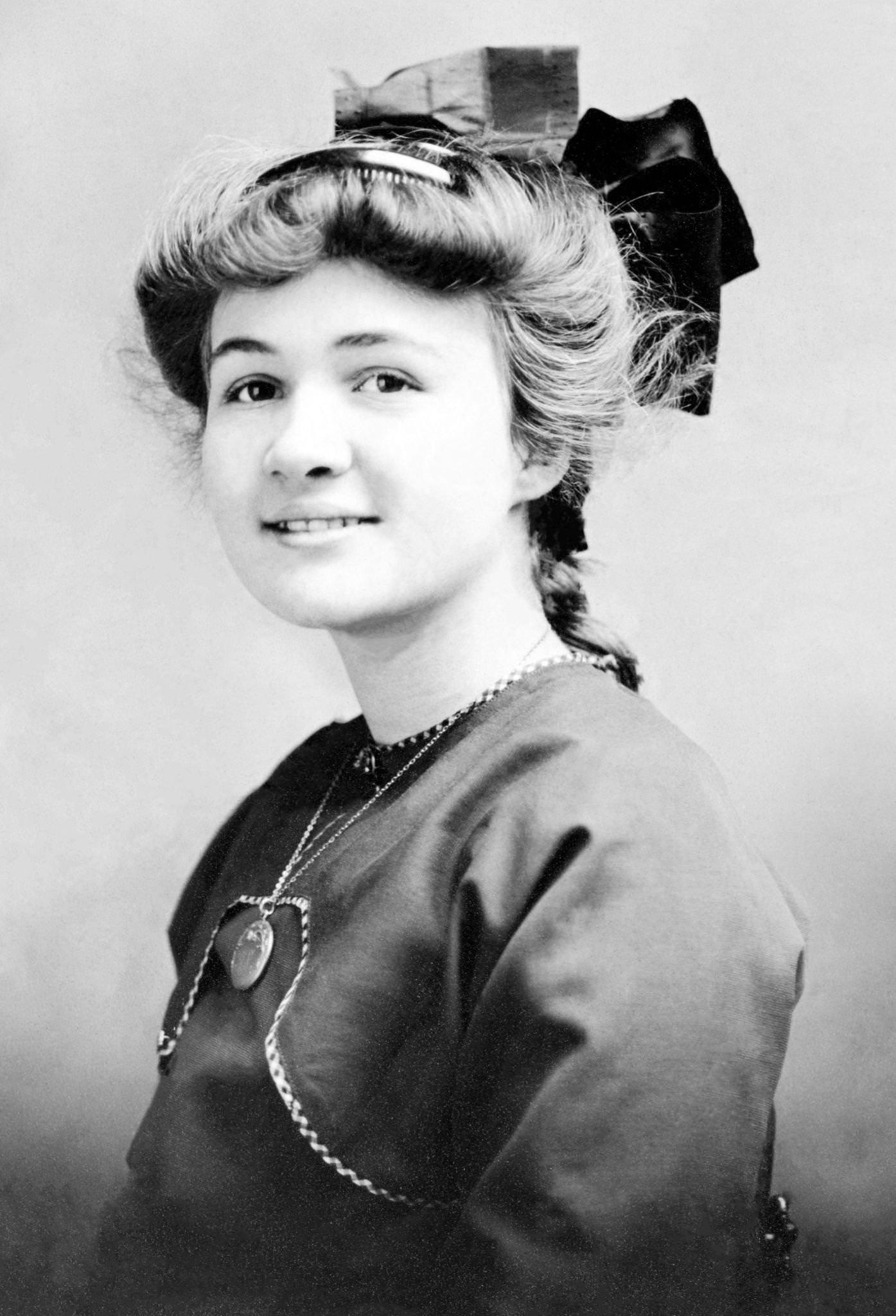 A Victorian woman wearing her Sunday best clothes, 1890