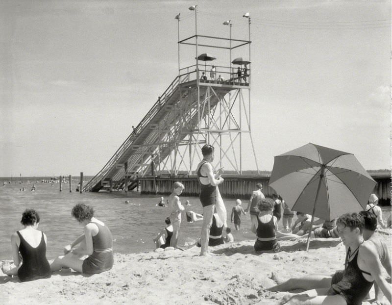 "Beach with sunbathers." Chapel Point, Washington's "playground on the Potomac" near La Plata, Maryland, 1940