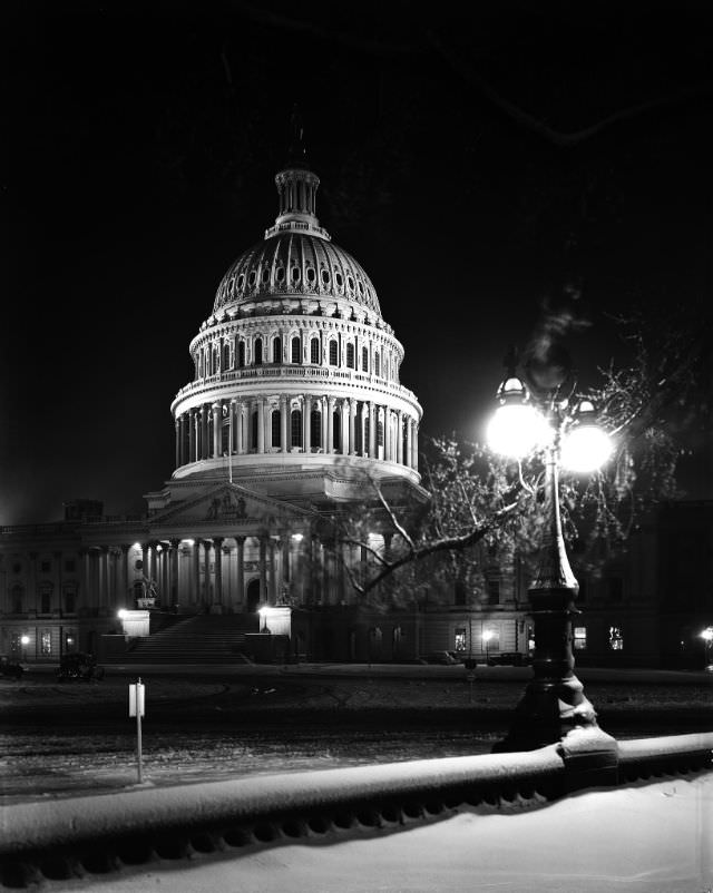 East front of U.S. Capitol at night in winter, 1940