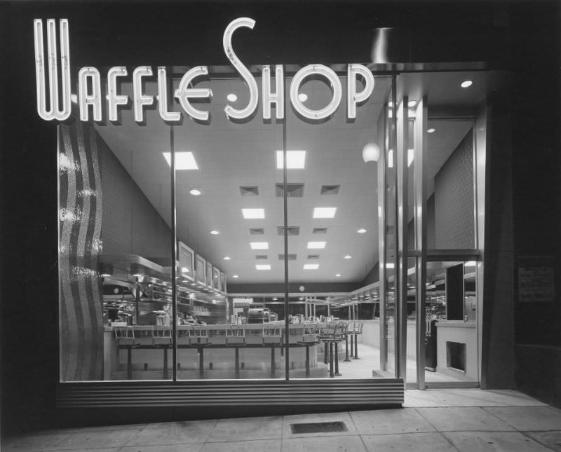 Shop on 10th Street. Exterior of Waffle Shop with neon sign, 1940s