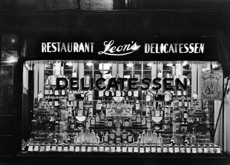 Window display of whiskey at Leon's Delicatessen, 1930s