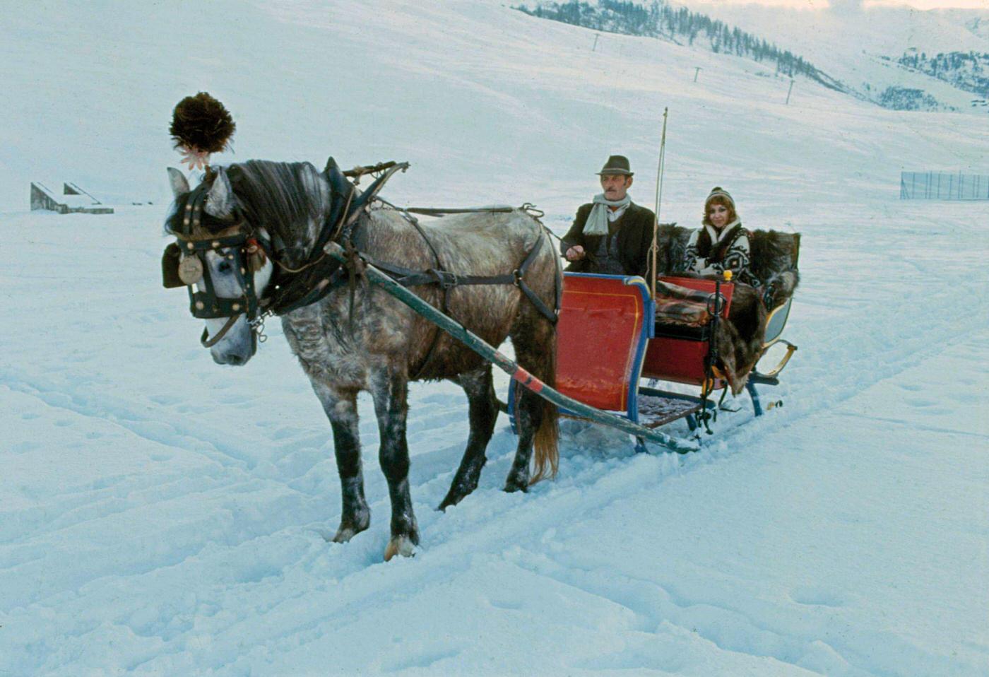 The singer Mia Martini (Domenica Rita Adriana Bertè) on a horse-drawn sleigh. Livigno, Italy. 1973