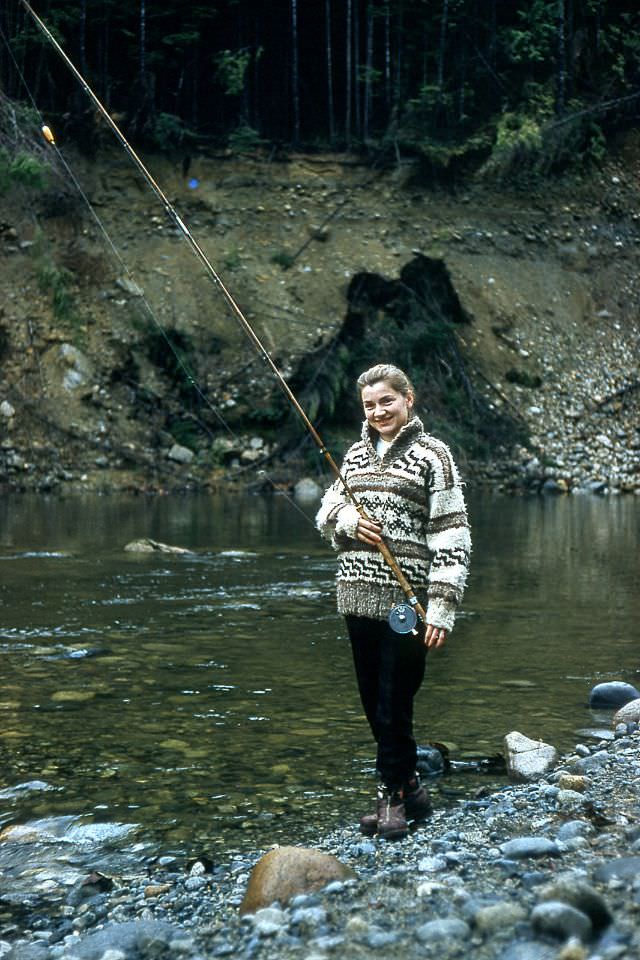 Arlene smith fishing the Alouette River near Haney, British Columbia, Canada, December 1959