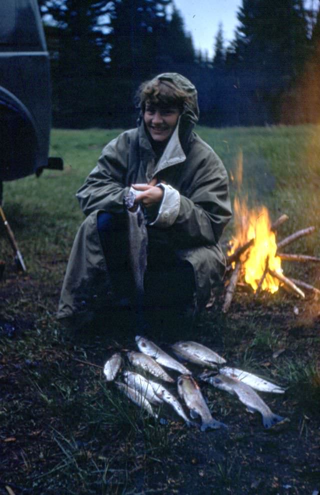 Arlene Smith, campfire and catch, Clearwater, British Columbia, Canada, June 1954