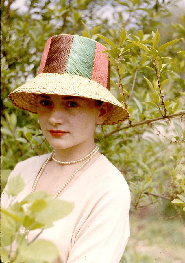 Arlene Smith with multi-colored straw hat, 1958
