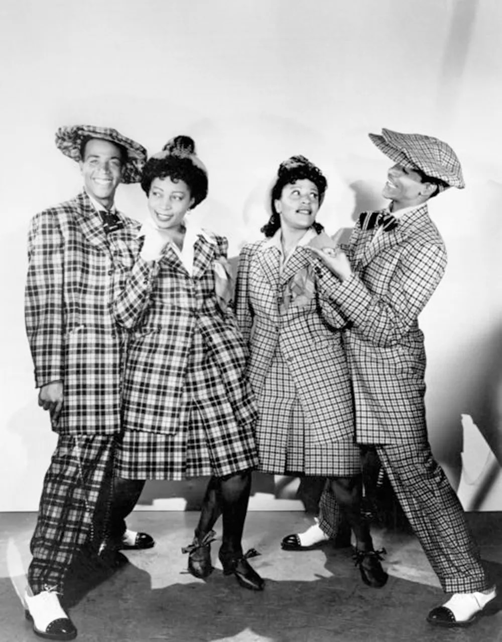 Entertainers wearing zoot suits for Hit Parade of 1943.