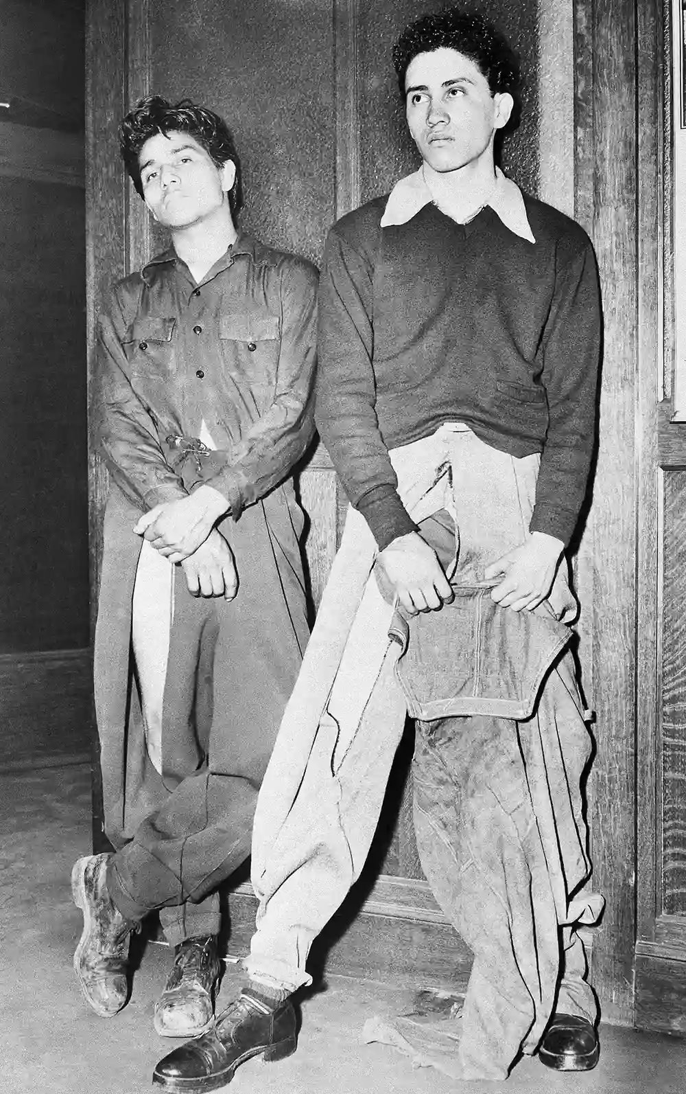 Noe Vasquez and Joe Vasquez are shown at the Los Angeles Police Department on June 10, 1943 after being attacked near Union Station by a gang of sailors, who had slashed their clothing.