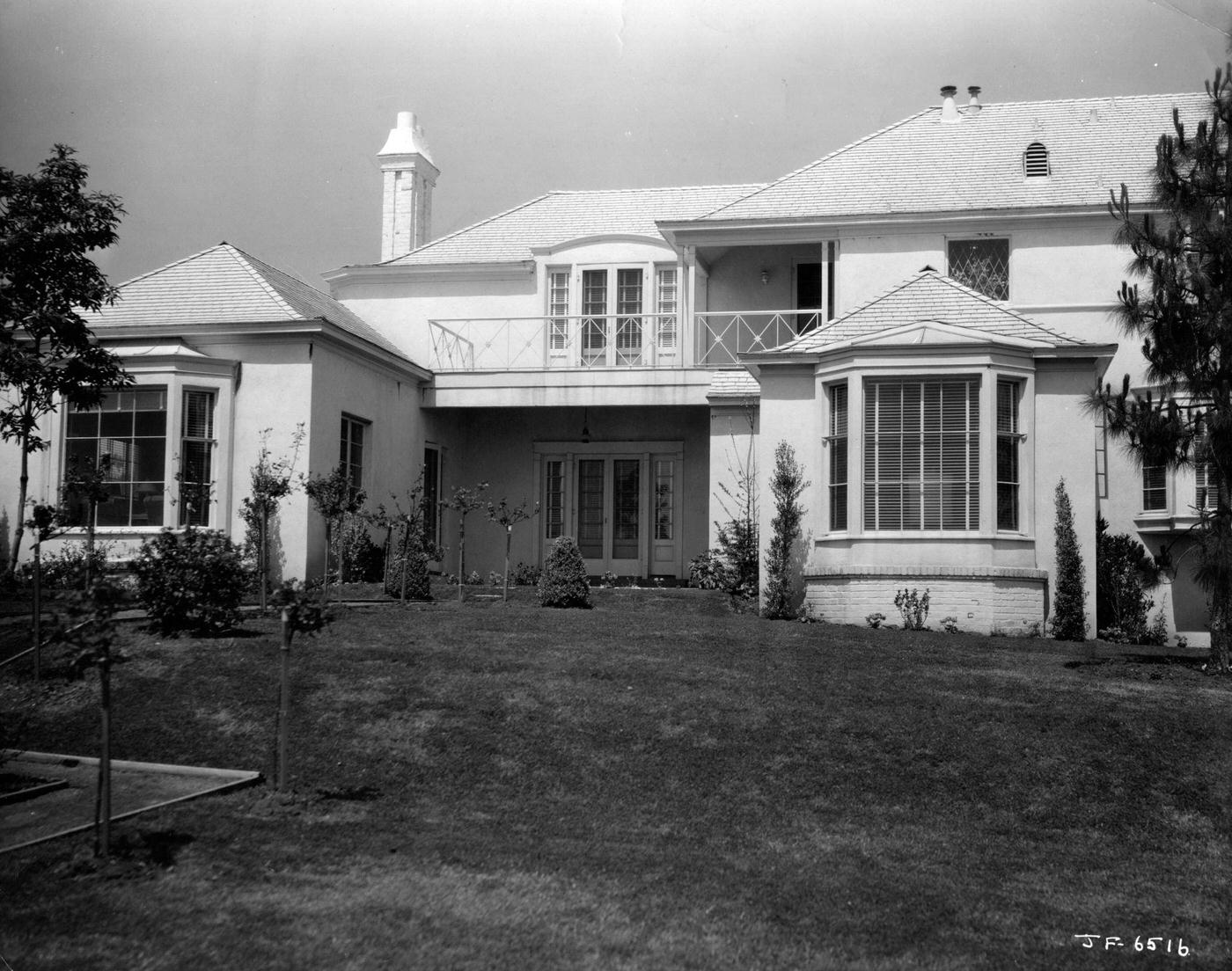 An exterior shot of Joan Fontaine's house in Hollywood, signed to RKO, 1930.