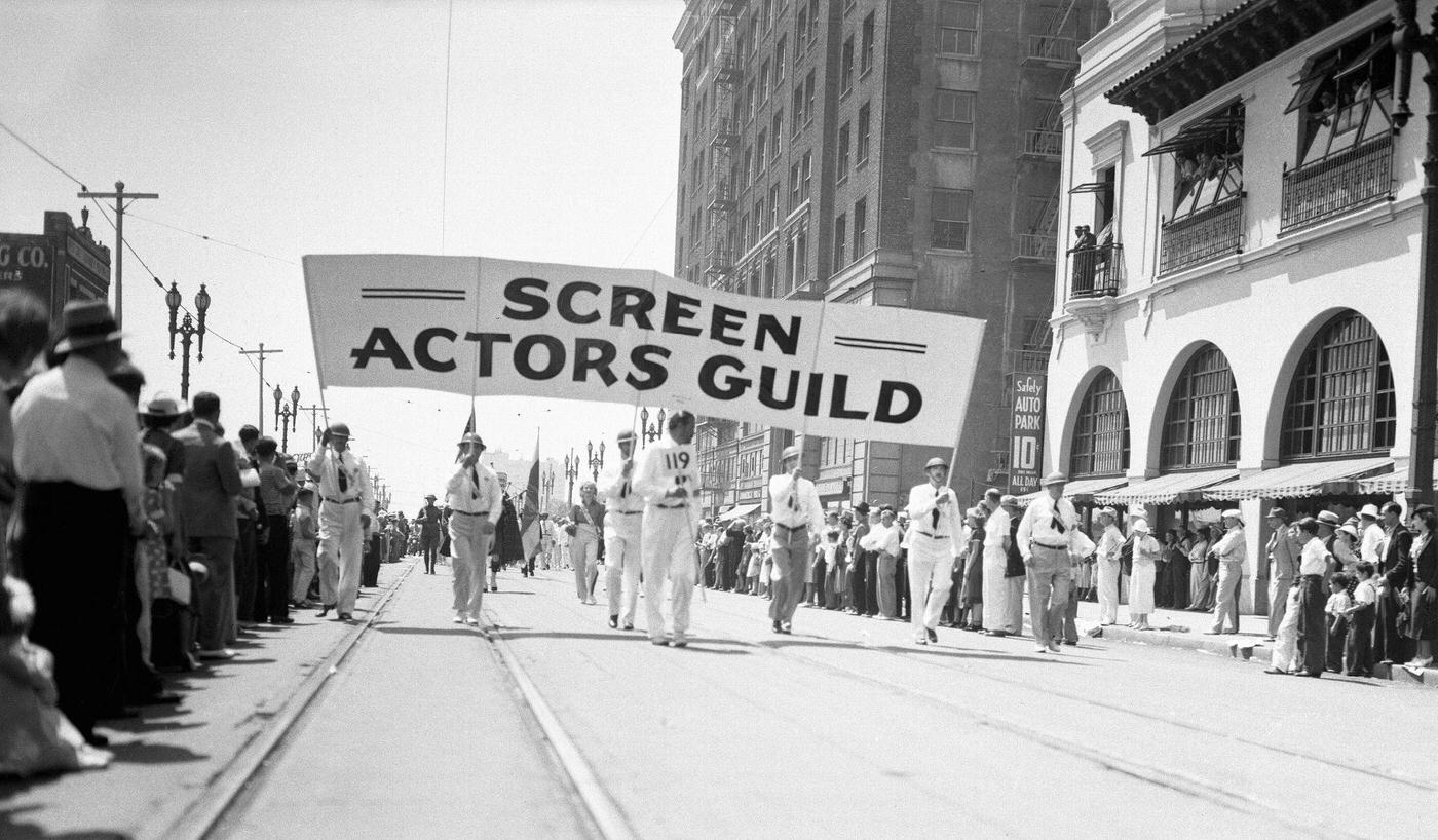 Screen Actors Guild marching in Labor Day Parade. Forty thousand union men and women marched through the streets of Los Angeles to demonstrate their rising strength. None but AFL unions were represented.