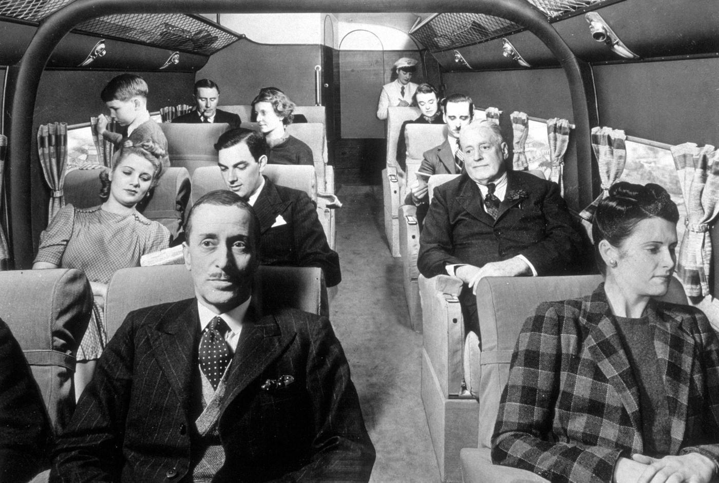 Passengers are seen on board a de Havilland Flamingo aeroplane, 1939