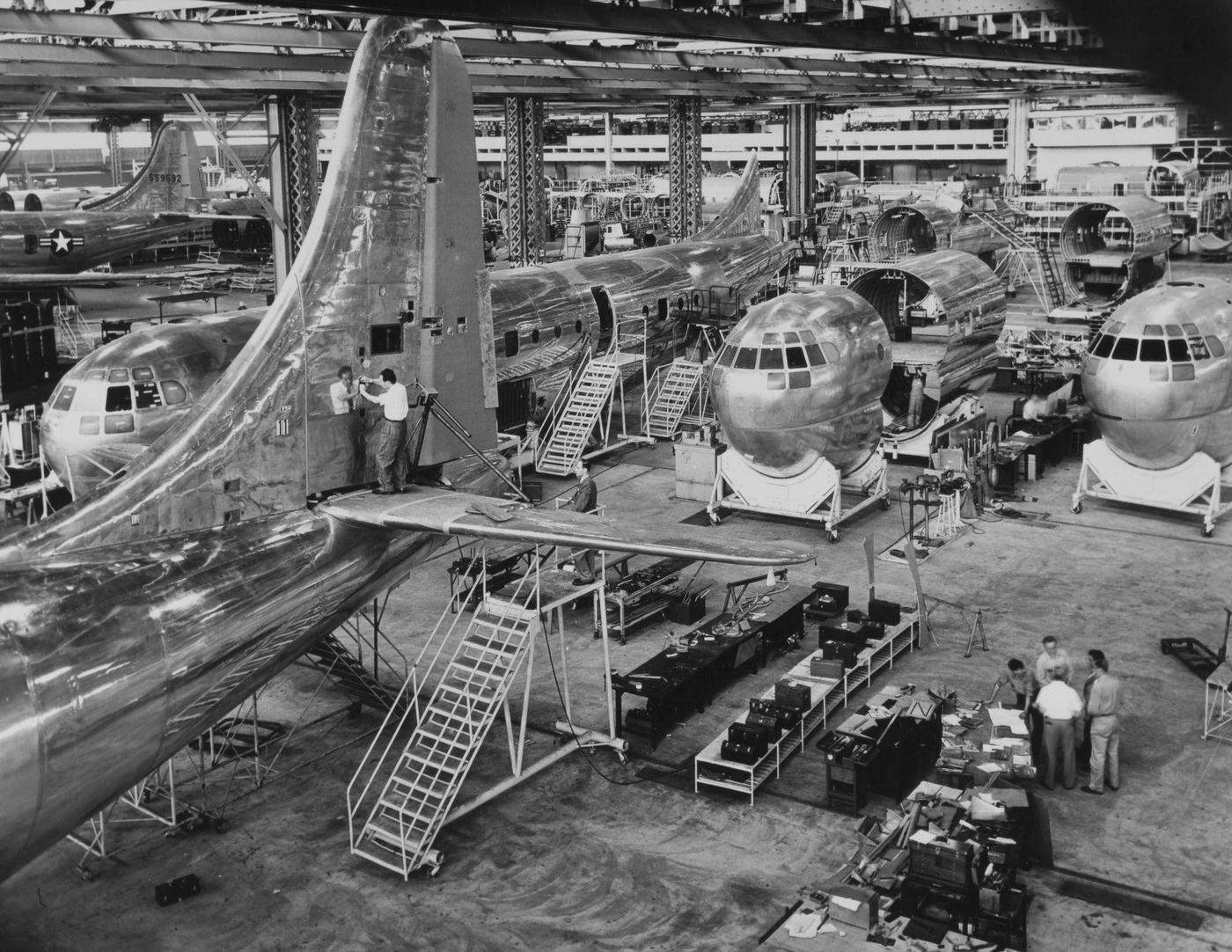 The factory floor of the Boeing Aircraft Company is shown featuring the manufacture of their Stratocruiser airliner.