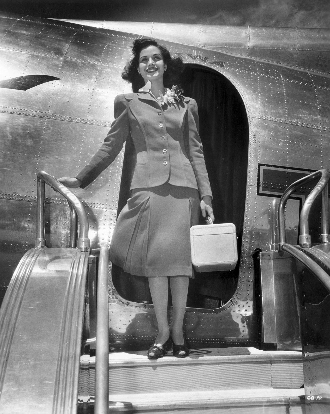 American stage and screen actress Carol Bruce is seen arriving at Los Angeles Airport to make her film debut at Universal Studios.