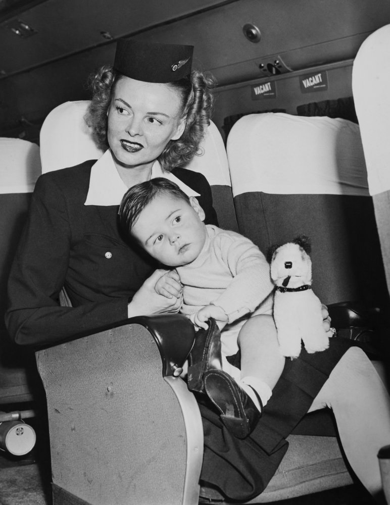 In July 1945, a baby travels by plane in New York.