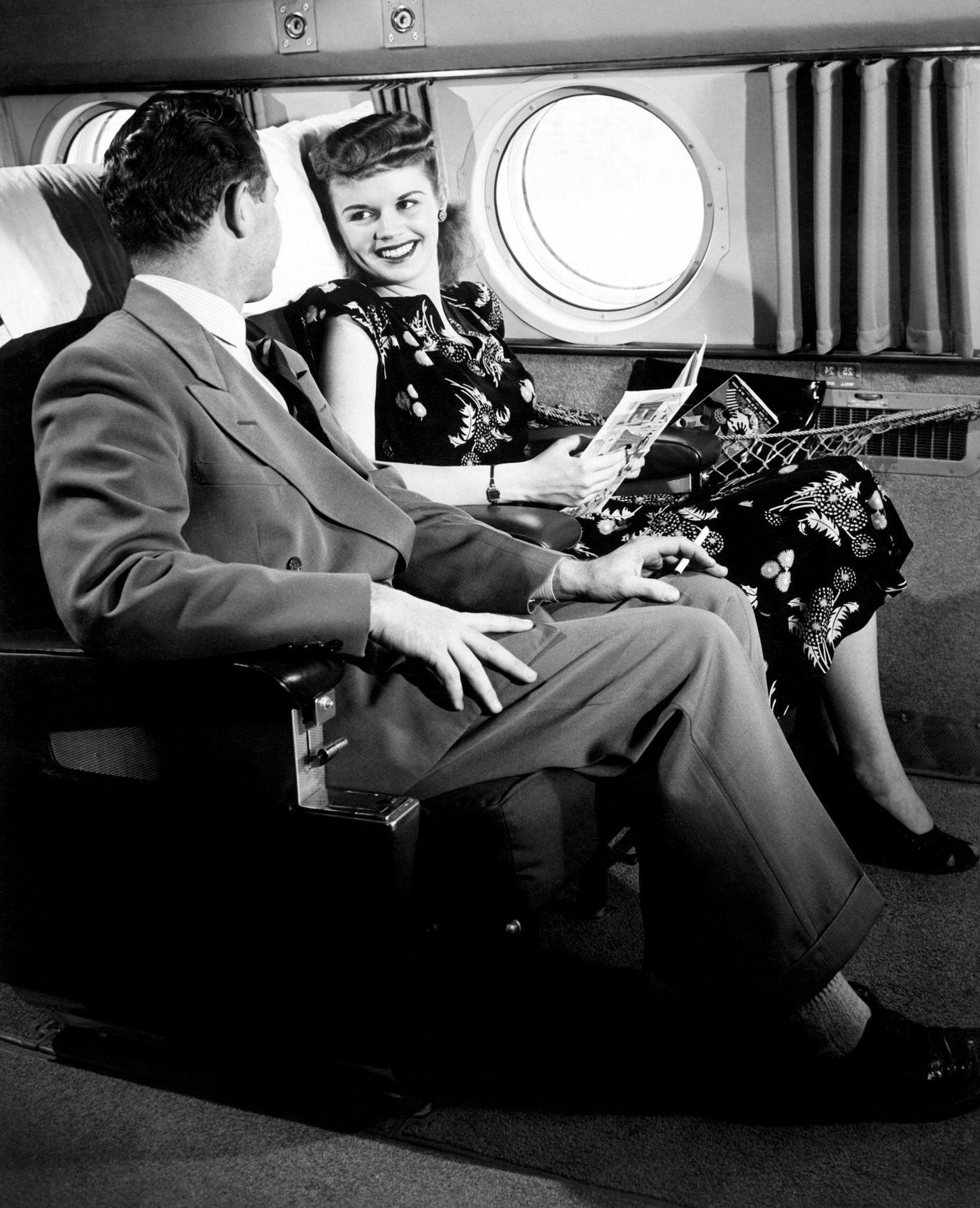 A couple is pictured on a plane in 1940.