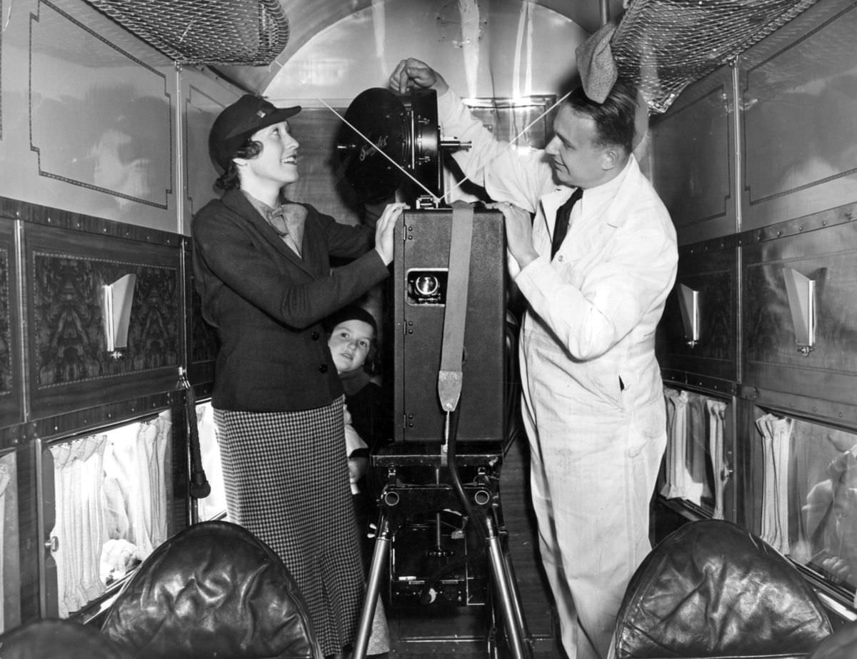 Luggage being unloaded from airplane, 1950s