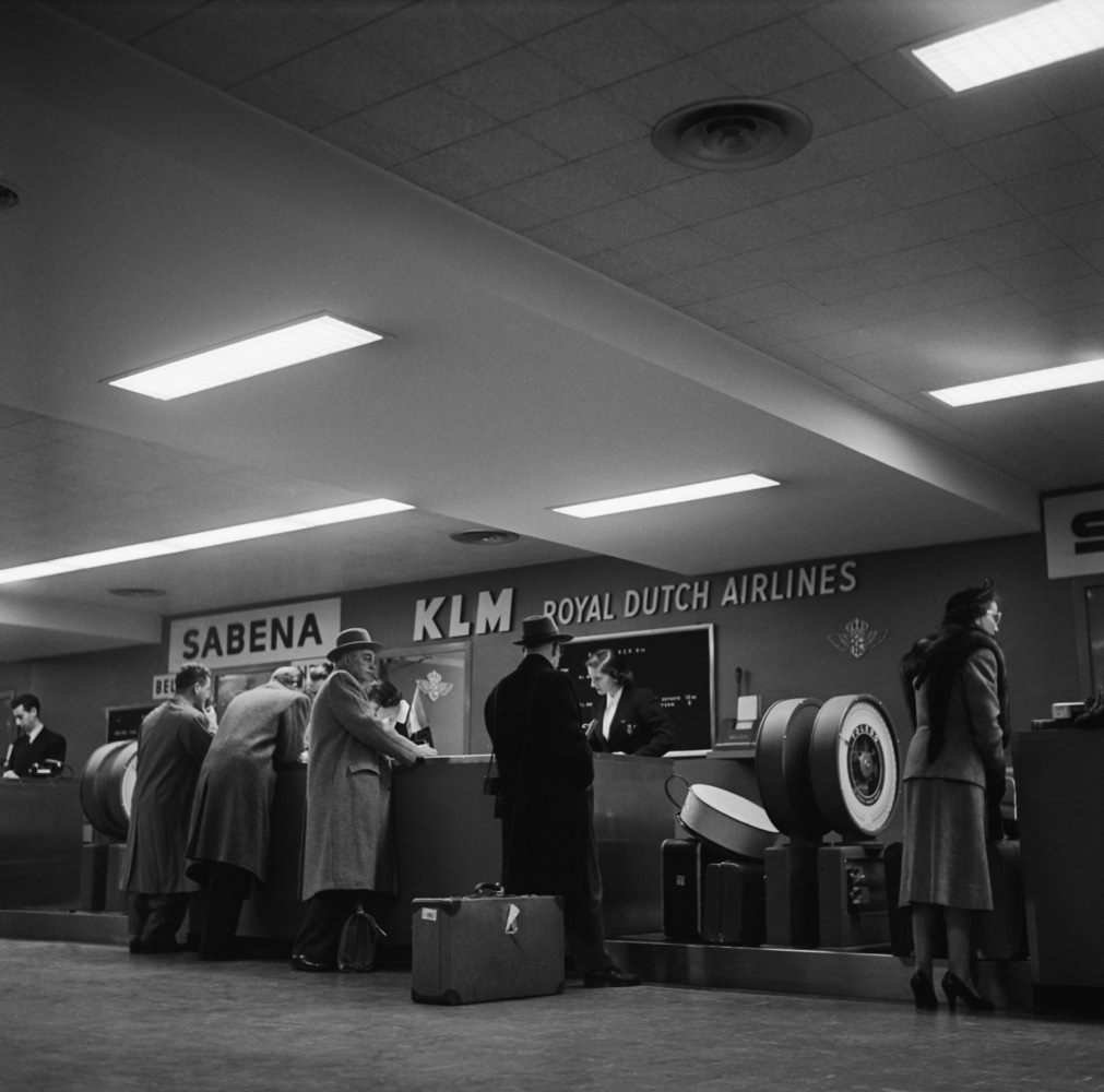 Passengers checking in at New York’s East Side Airlines Terminal, 1950s