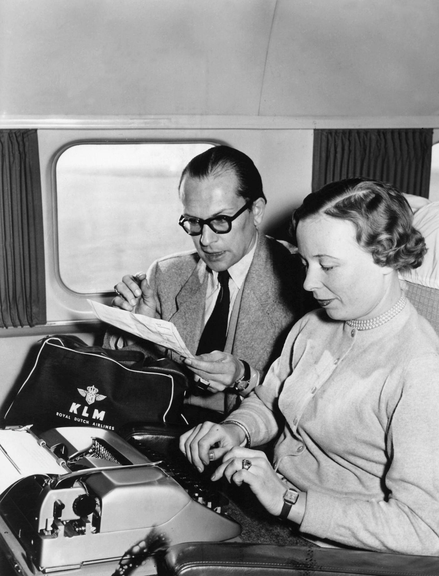 A secretary from KLM is captured doing dictation on board a KLM passenger plane at Frankfurt Airport in January 1955.