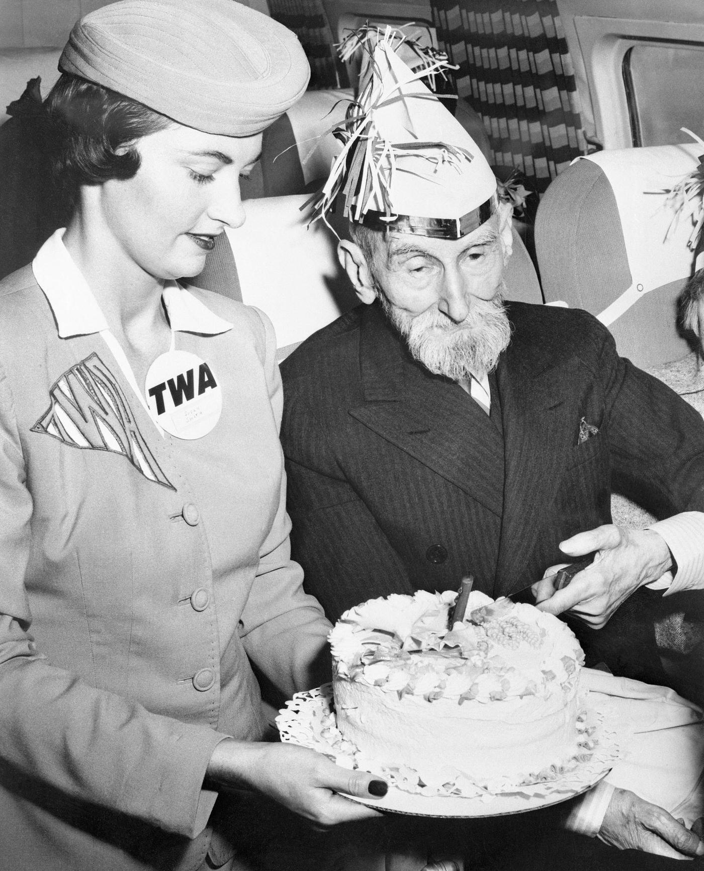 Kentucky Colonel Ward Elmore, who is one of 25 people from the Laguna Honda Home in San Francisco, makes his first plane flight on August 22, 195?, and also celebrates his first 100 years.