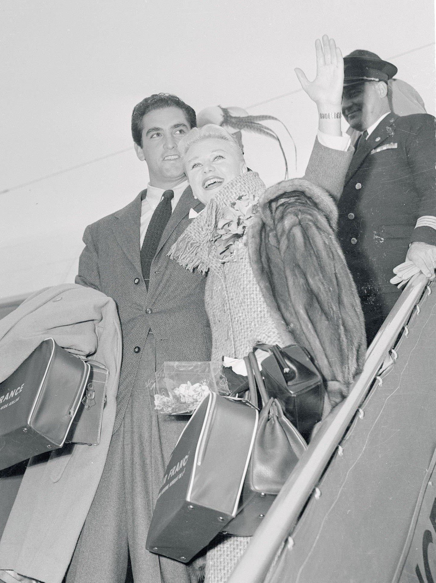 Ginger Rogers, a famous screen actress, and her husband, French actor Jacques Bergerac, arrive at ParisOrly airport after flying from the United States.