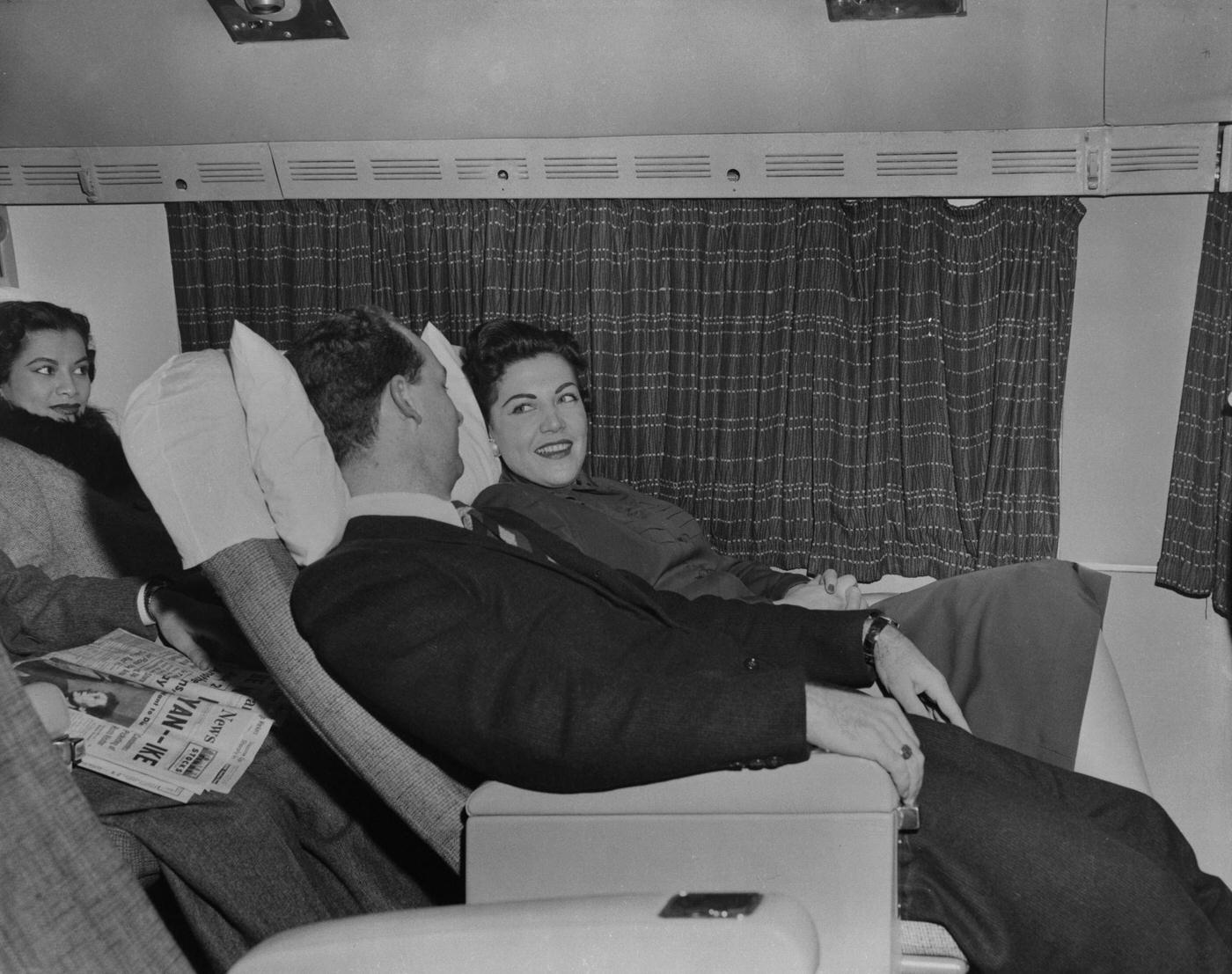 Passengers get ready to nap on a Transocean Air Lines Boeing 377 Stratocruiser in the mid1950s. Transocean Air Lines was a pioneer discount airline that operated between 1946 and 1962.
