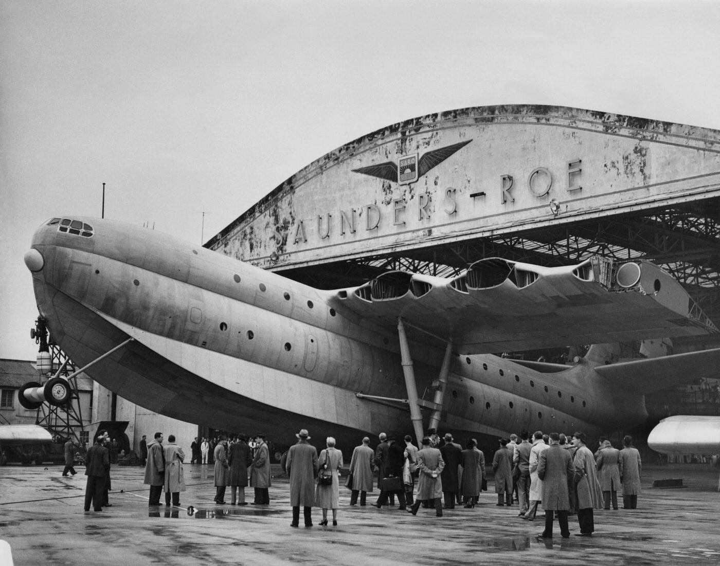 The SaundersRoe SR45 Princess passenger flying boat prototype, GALUN, emerges from its hangar at the SaundersRoe Cowes facility on the Isle of Wight in the United Kingdom on October 31, 1951.