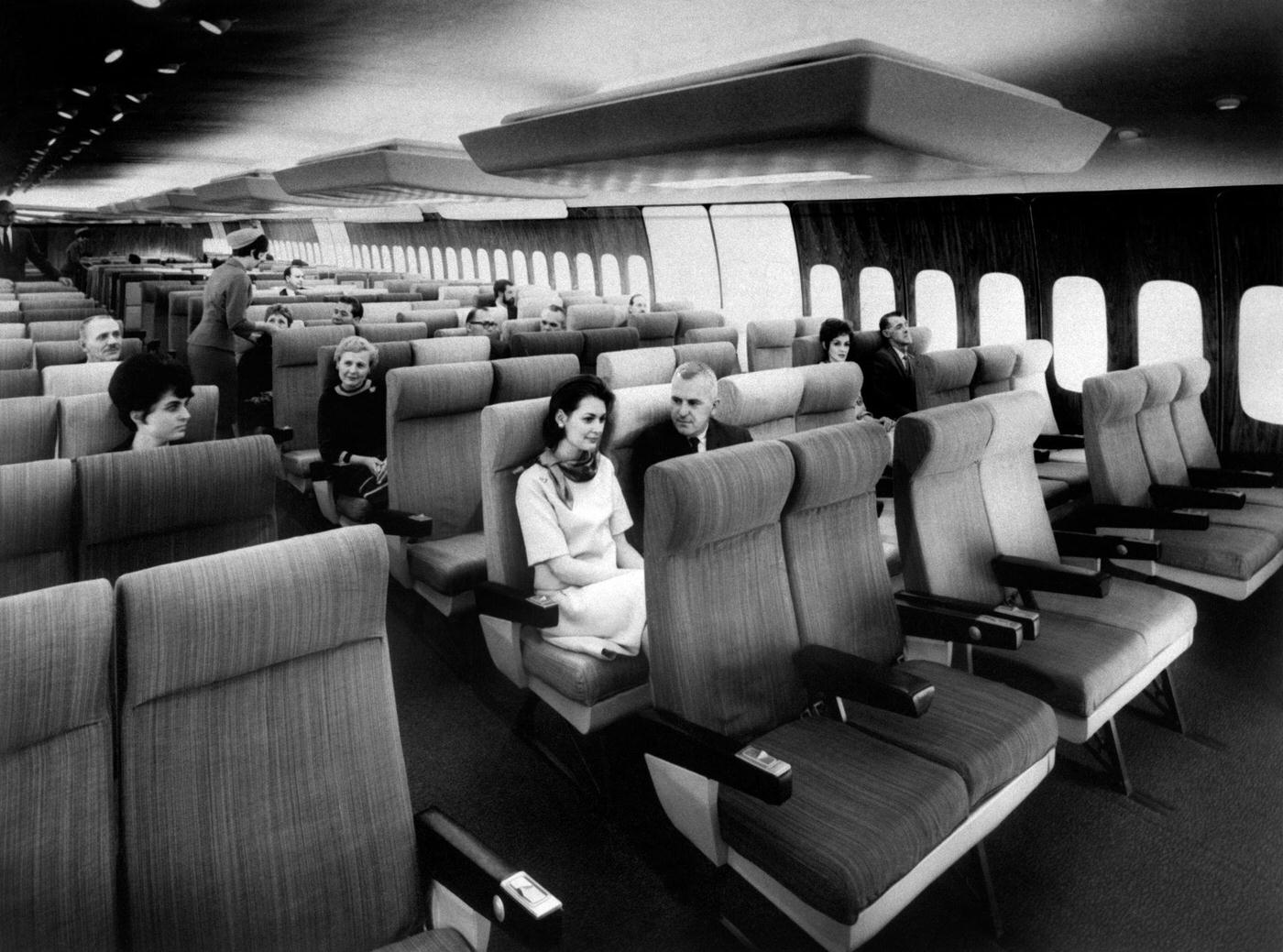 A model of an Air France Boeing 747 Jumbo Jet interior with passengers in 1966.