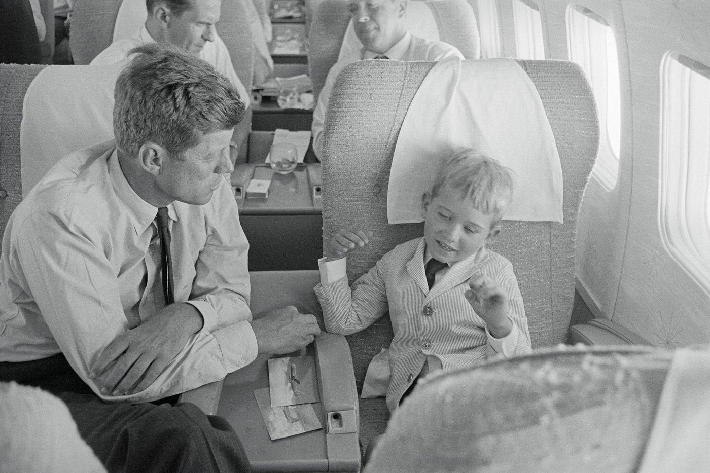 John F. Kennedy entertaining his nephew Bobby Kennedy Jr. on a flight from the Democratic National Convention.