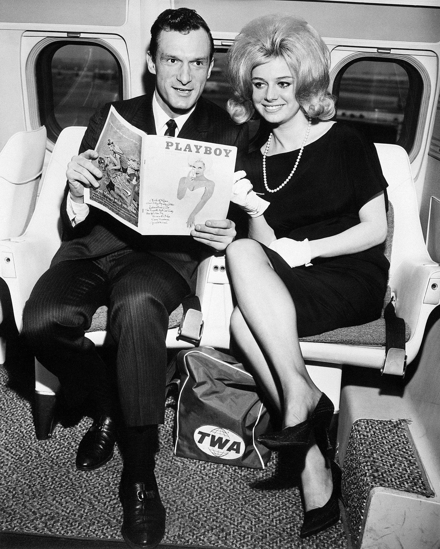 Hugh Hefner, Editor and Publisher of Playboy, and Cynthia Maddox, the blond cover girl on the February issue of his magazine, arriving by TWA superjet from Chicago in New York City on January 29, 1962.