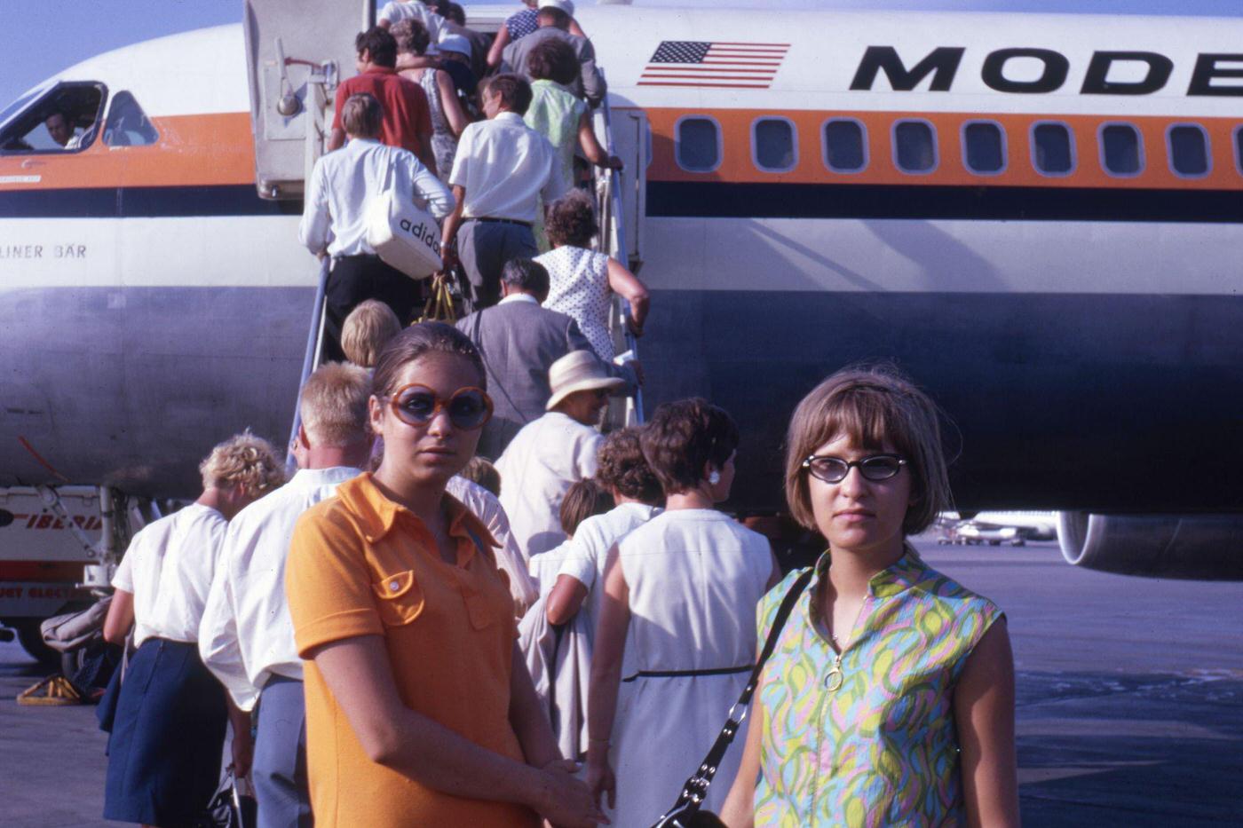 Passengers at the airplane in Spain. Date unspecified.