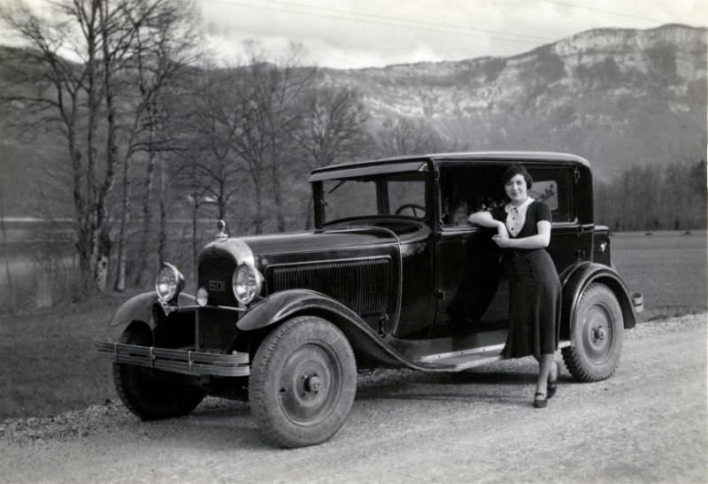 Lady with Citroën Six on gravel road, 1935