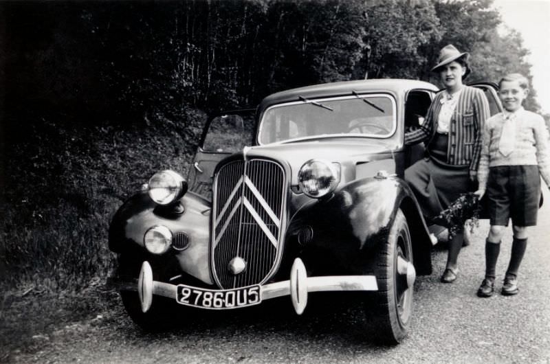 Mother and son with Citroën 7 CV, 1938