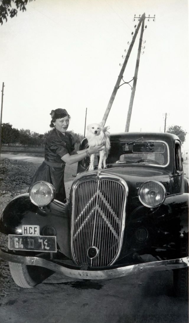 Lady with pet and Citroën 11 CV, 1938